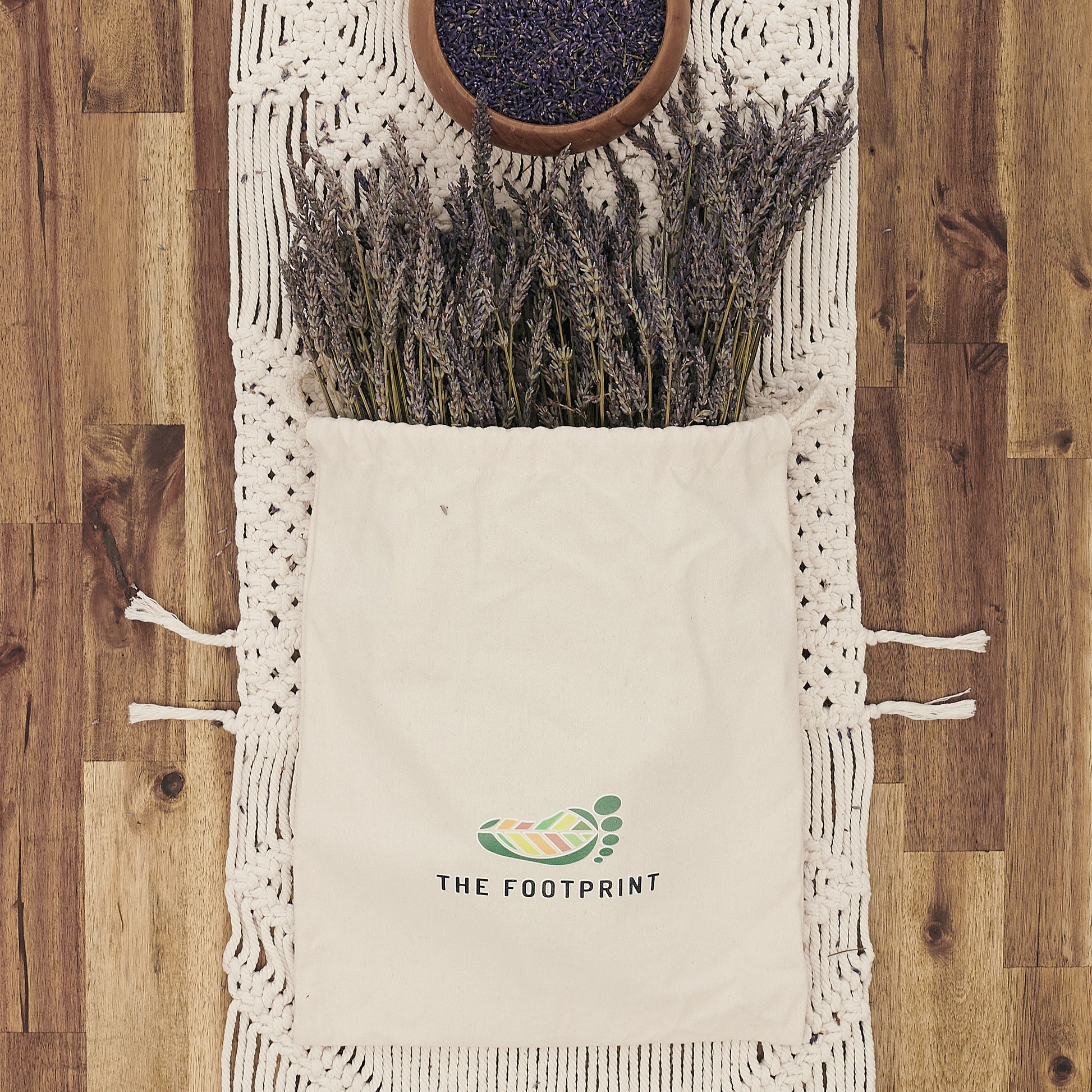 Macrame table runner decorated with pottery and zero waste cotton pouch filled with dried lavender 
