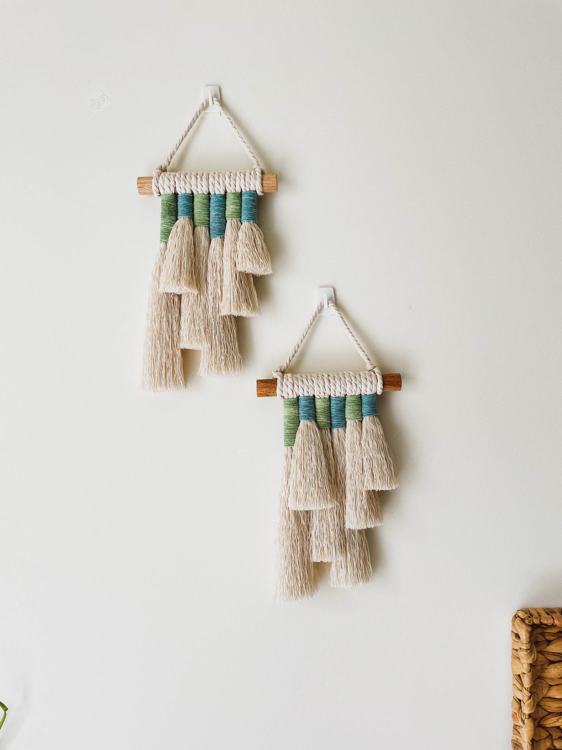 Two Ocean Breeze Mini wall hangings hanged on a wall front view